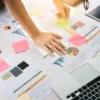 An Excel template with a Merger and Acquisition Model and calculations of Synergies, Levered and Unlevered Cash Flows, Headcount Projections, Balance Sheet, Return on Investment and Sensitivity Analysis. Merger and Acquisition Model Template Cover.
